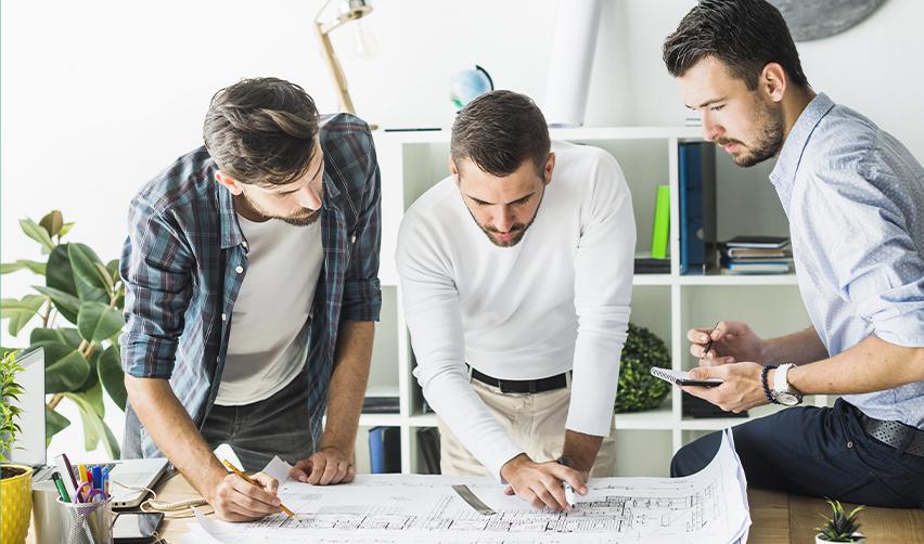 A group of project developers working on an EB5 project.