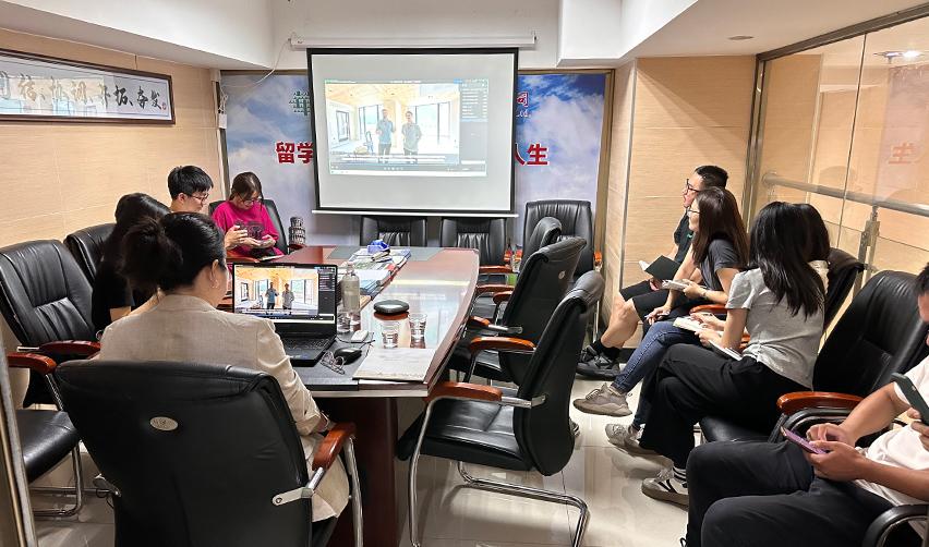 A group of people sitting around a table
