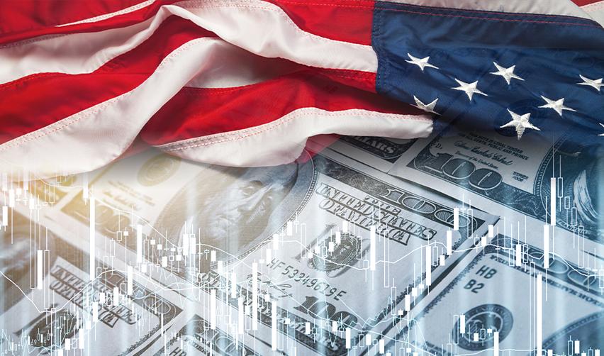 The U.S. flag on top of stacks of dollars symbolizing investor capital or job creation in the United States through regional center projects.