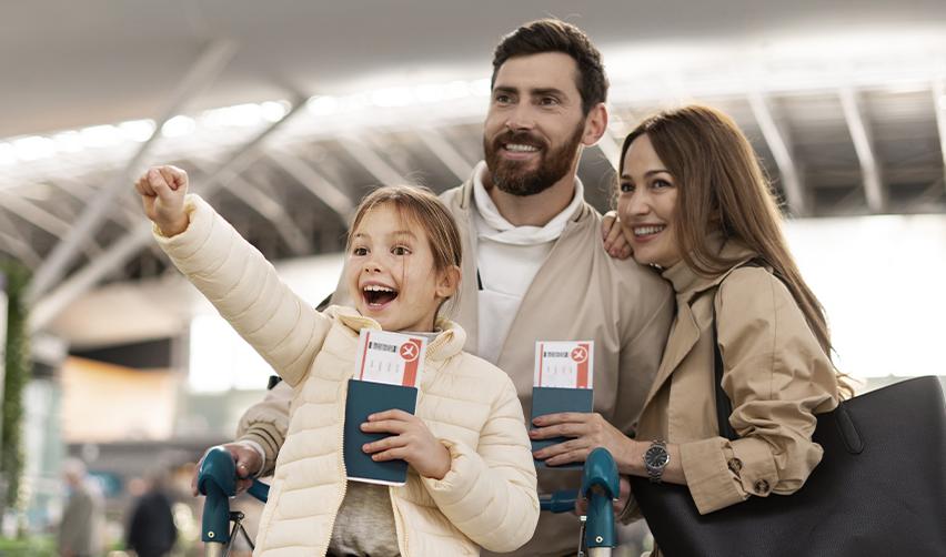 A family of EB5 green card holders traveling at an airport.