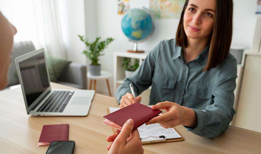 A United States Citizenship and Immigration Services Officer processing a foreign investor's EB5 visa application.