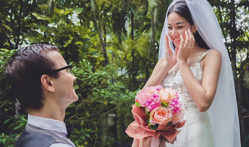 A Singaporean bride and groom, symbolizing obtaining a US visa through marriage.
