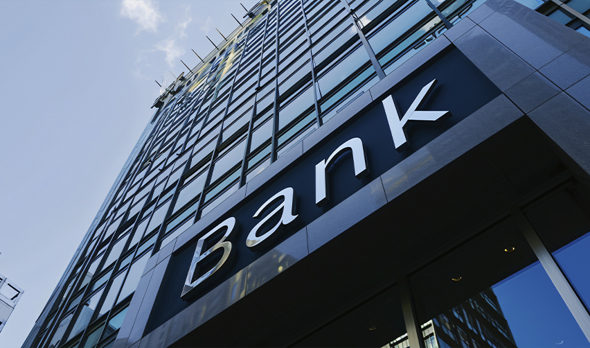 A modern institutional bank, highlighting the role of third-party lenders in EB5 financing and how their due diligence improves investment safety.