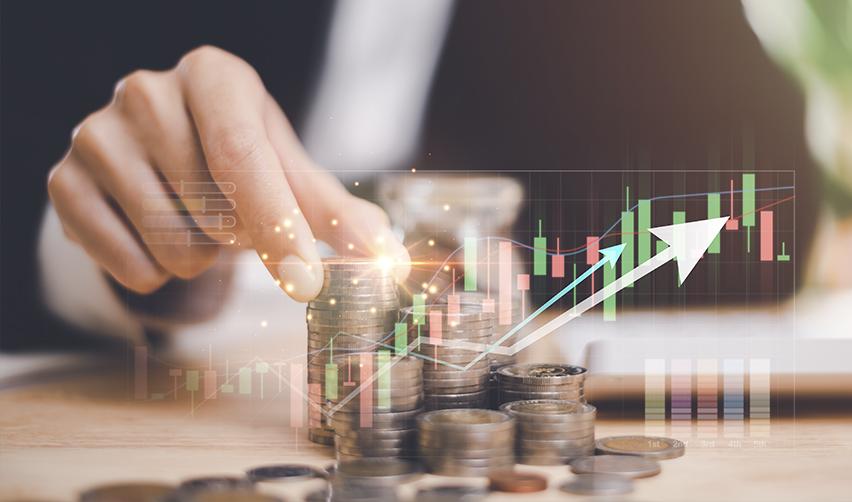 A financial growth concept featuring stacked coins and an upward-trending graph, illustrating the benefits of investment-based immigration, such as the EB5 Immigrant Investor Program, for Israeli citizens seeking adjustment of status through economic contributions.