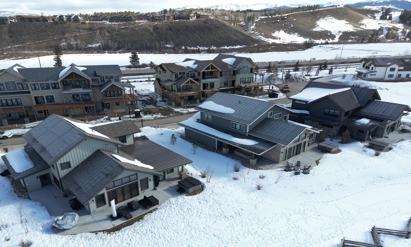 A group of houses in a snowy area
