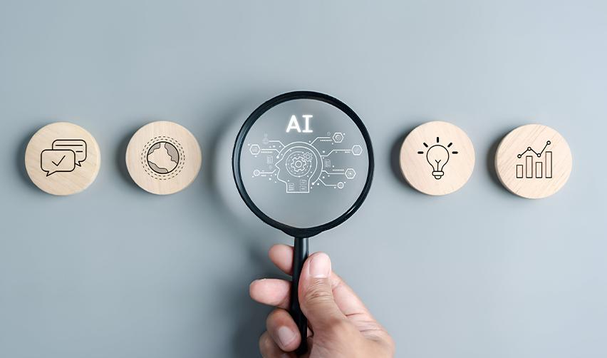 Magnifying glass highlighting AI icons surrounded by wooden discs with communication, profile, idea, and growth symbols, representing how AI enhances EB5 project evaluation and risk assessment.