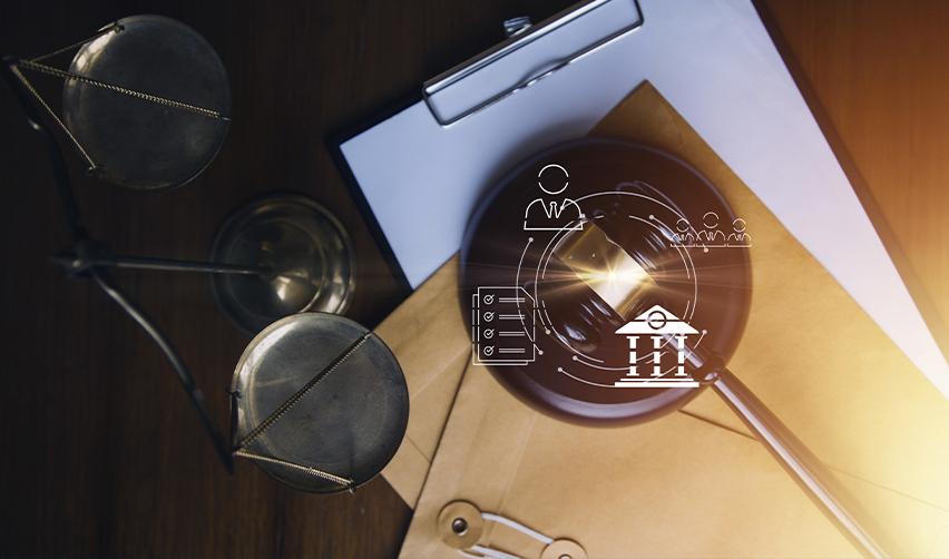 Close-up of a judge’s gavel and legal scales with digital law icons, symbolizing EB5 investors proving lawful source of funds through compliance and documentation.